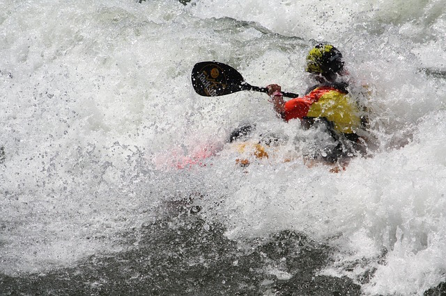 A whitewater kayaker in flow state