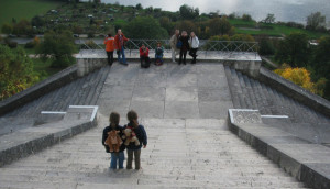 Move beyond exercise: a family takes pictures while climbing the stairs