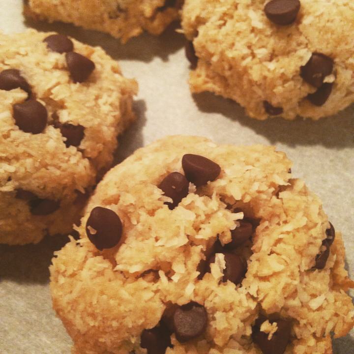 Vegan Coconut Macaroons don't last long at our house, displayed in a glass container. 